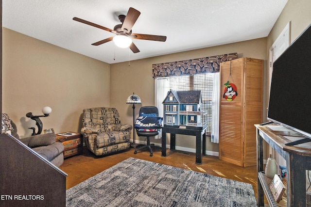 office area with ceiling fan