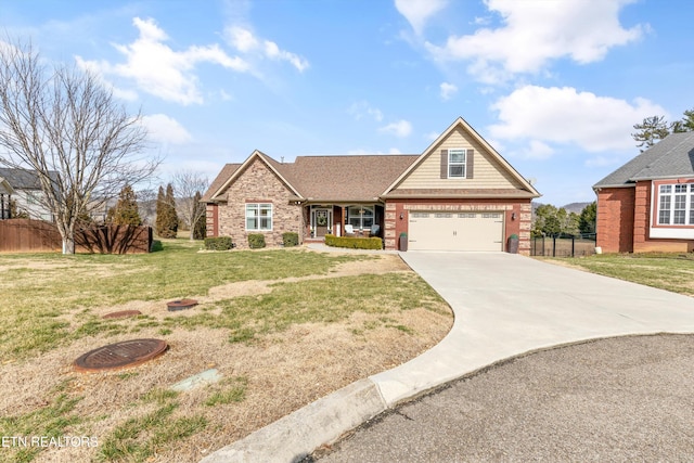 craftsman house with a front yard and a garage