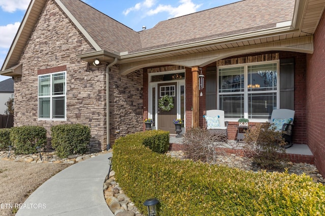 doorway to property with covered porch