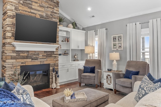 living room with lofted ceiling, crown molding, dark hardwood / wood-style flooring, and a healthy amount of sunlight