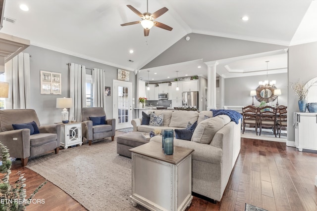 living room featuring ornamental molding, ornate columns, and dark hardwood / wood-style flooring