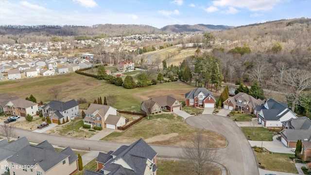 drone / aerial view featuring a mountain view