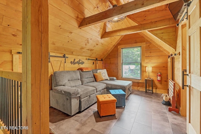 tiled living room with a barn door, vaulted ceiling with beams, wooden ceiling, and wooden walls