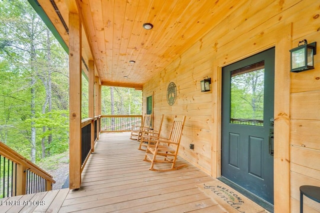 wooden deck with a porch