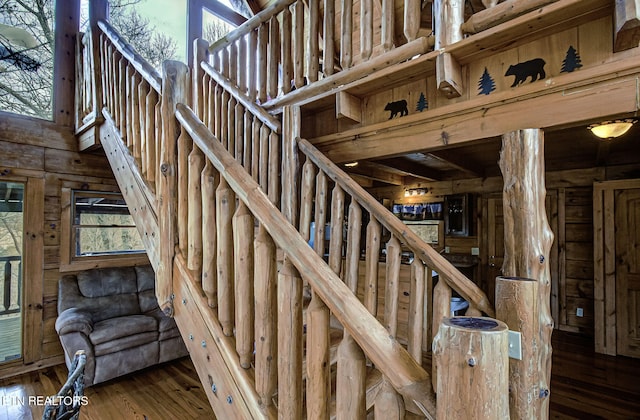 stairs with hardwood / wood-style flooring