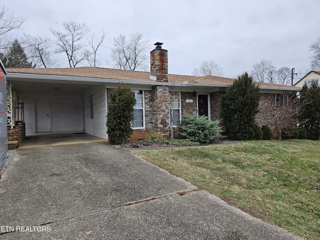 ranch-style house with a carport and a front yard