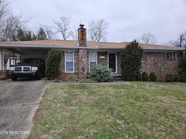 single story home with a carport and a front lawn