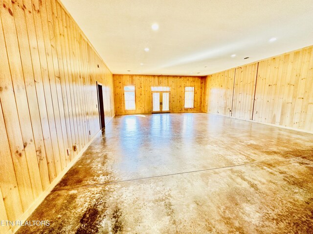 617 Cheyenne Dr, Jamestown, TN 38556 - unfurnished living room featuring finished concrete floors and wooden walls