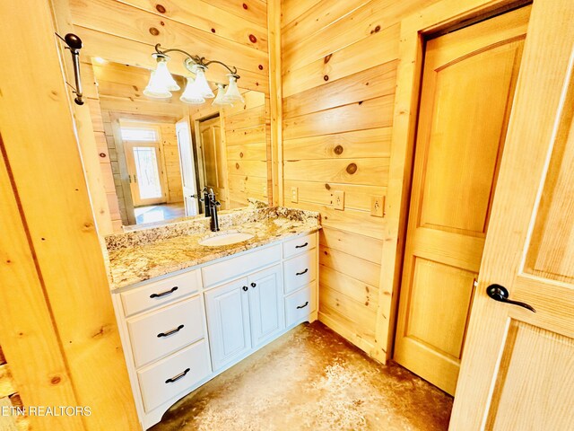 617 Cheyenne Dr, Jamestown, TN 38556 - bathroom with vanity, concrete floors, and wood walls