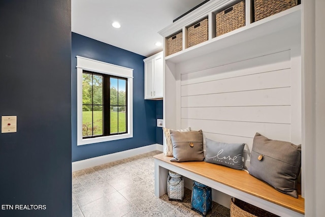 mudroom with light tile patterned flooring