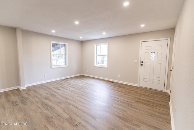 interior space with light hardwood / wood-style flooring