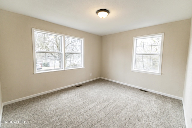 view of carpeted spare room