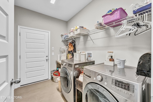 laundry room featuring laundry area and washer and clothes dryer