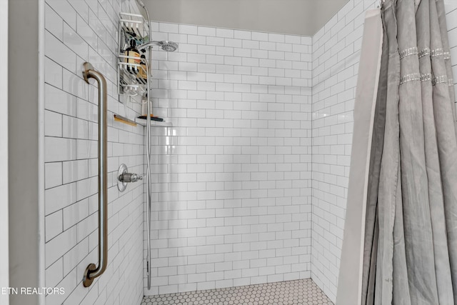 full bath featuring a stall shower