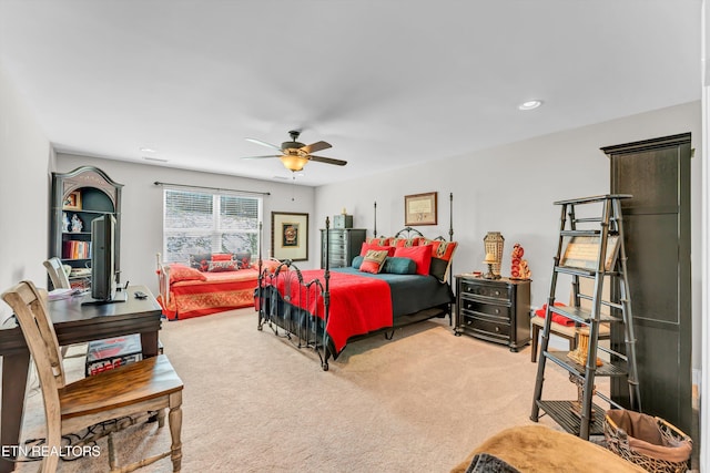 bedroom with light carpet and ceiling fan