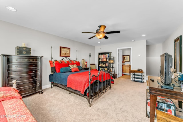 carpeted bedroom featuring ceiling fan, baseboards, and recessed lighting