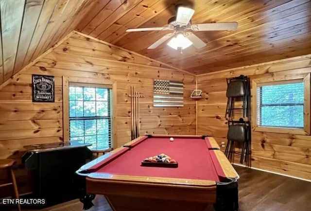 game room with vaulted ceiling, wood walls, wood finished floors, and wood ceiling