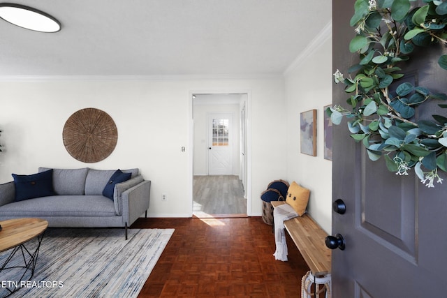 living room with ornamental molding and dark parquet floors