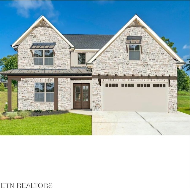 1523 Liberty Park Rd, Knoxville, TN 37922 - view of front facade with a standing seam roof, french doors, stone siding, and a front lawn