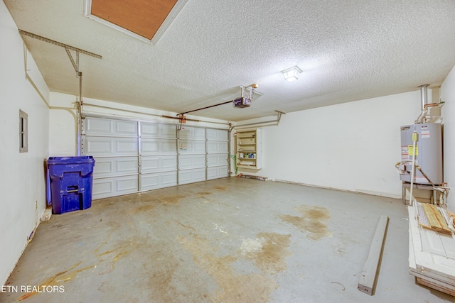 garage with a garage door opener and water heater