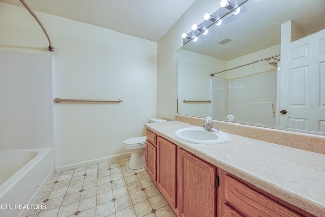 bathroom featuring a textured ceiling, toilet, visible vents, bathing tub / shower combination, and vanity