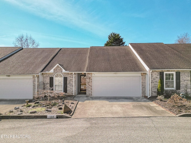 ranch-style house featuring a garage