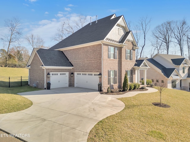 view of home's exterior featuring fence, driveway, a yard, a garage, and brick siding