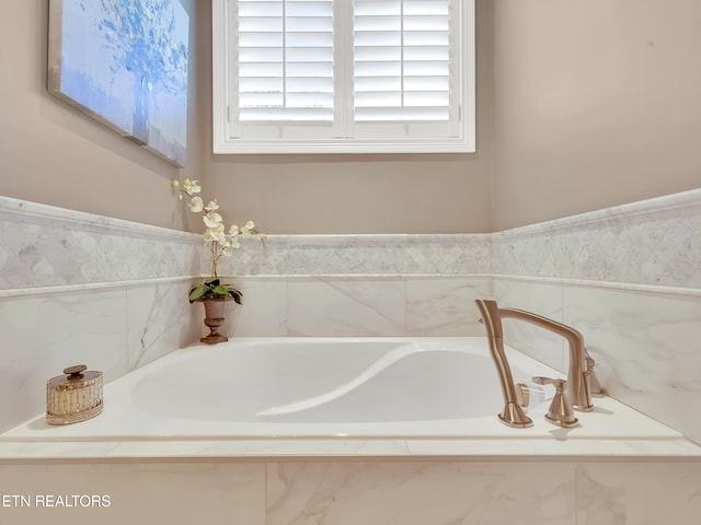 bathroom featuring a garden tub