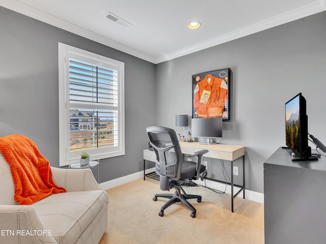 carpeted home office featuring visible vents, baseboards, and ornamental molding