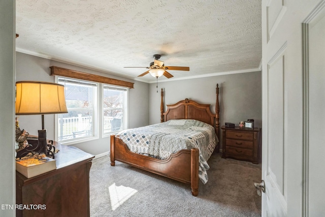 bedroom featuring crown molding, a textured ceiling, a ceiling fan, and light colored carpet