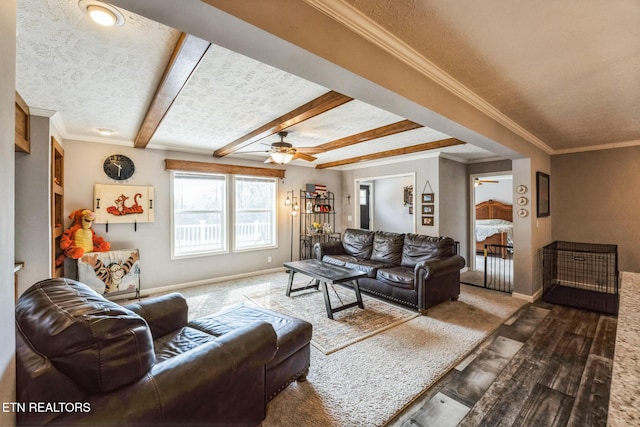 living room featuring ceiling fan, ornamental molding, beamed ceiling, and wood finished floors