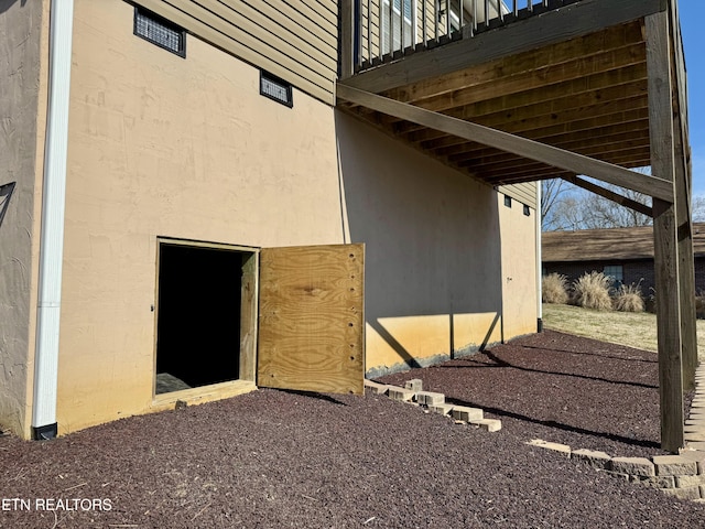 exterior space with stucco siding