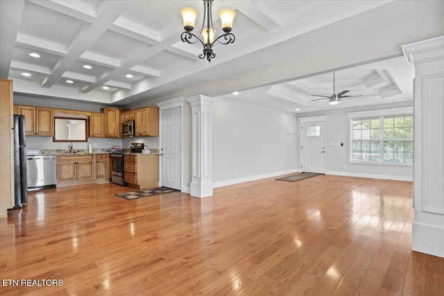 unfurnished living room with decorative columns, baseboards, coffered ceiling, light wood-style flooring, and ceiling fan with notable chandelier