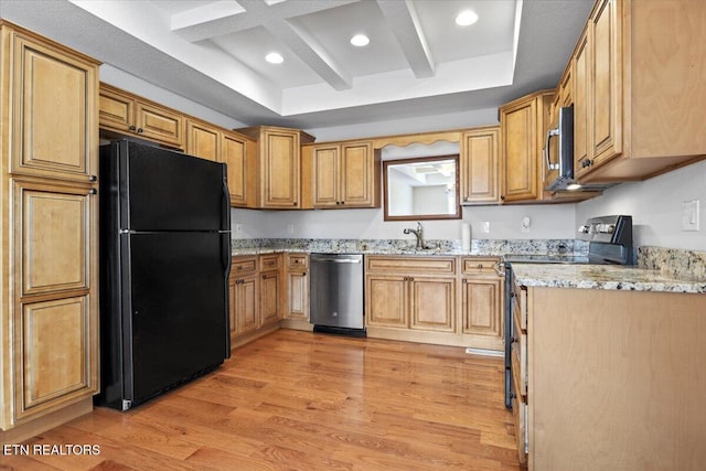 kitchen with light wood-style flooring, appliances with stainless steel finishes, beamed ceiling, light stone countertops, and a sink