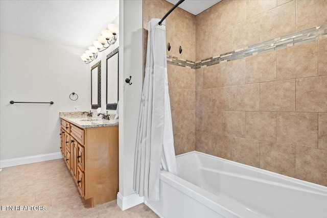 full bathroom with tile patterned flooring, shower / bath combo, baseboards, and vanity