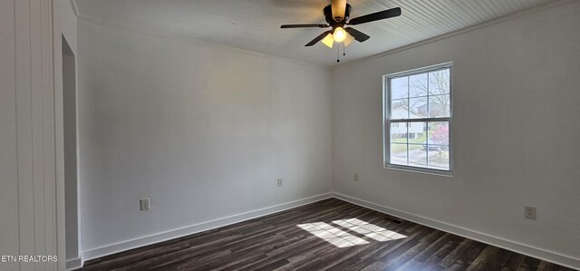 empty room with a ceiling fan, dark wood-style floors, and baseboards