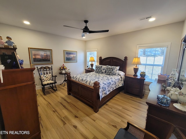 bedroom with light wood-style floors, visible vents, a ceiling fan, and recessed lighting