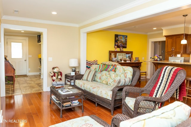 1017 Old Knoxville Hwy, Sevierville, TN 37862 - living room with hardwood / wood-style flooring and crown molding