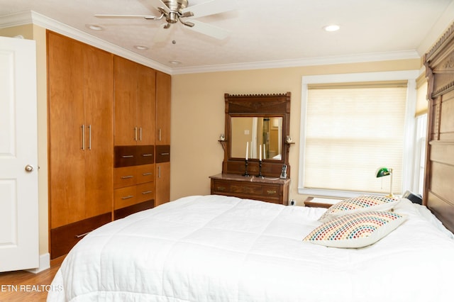 1017 Old Knoxville Hwy, Sevierville, TN 37862 - bedroom with ceiling fan, ornamental molding, and wood-type flooring