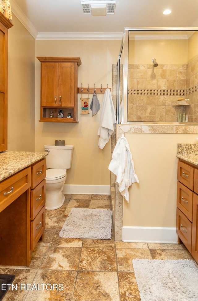 1017 Old Knoxville Hwy, Sevierville, TN 37862 - bathroom with toilet, tiled shower, crown molding, and vanity
