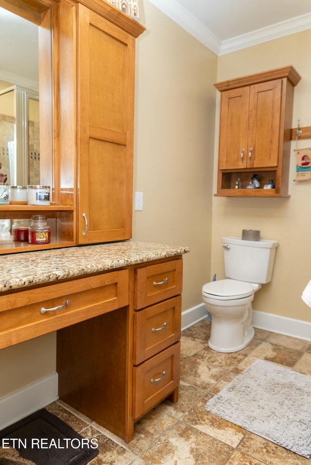 1017 Old Knoxville Hwy, Sevierville, TN 37862 - bathroom with toilet, vanity, walk in shower, and crown molding