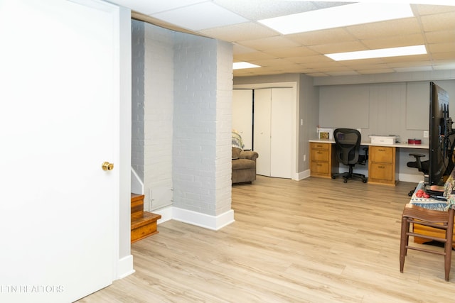 1017 Old Knoxville Hwy, Sevierville, TN 37862 - office area with a drop ceiling and light hardwood / wood-style flooring