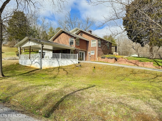 1017 Old Knoxville Hwy, Sevierville, TN 37862 - exterior space featuring a front yard and a porch