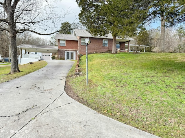 view of side of property with french doors and a yard