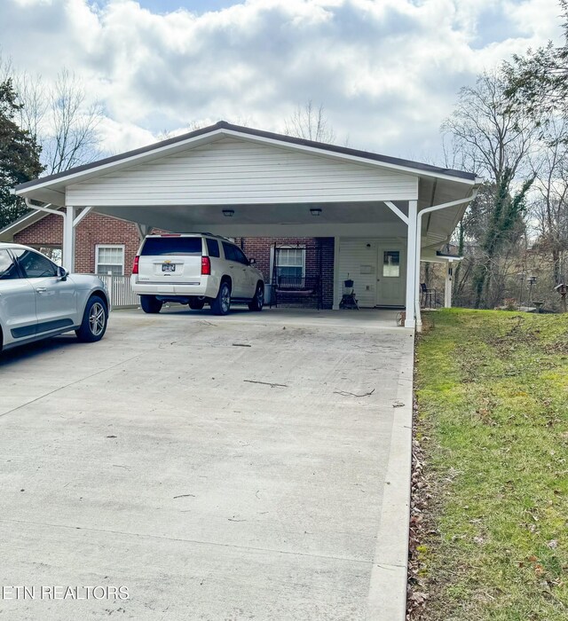 1017 Old Knoxville Hwy, Sevierville, TN 37862 - exterior space with a lawn and a carport