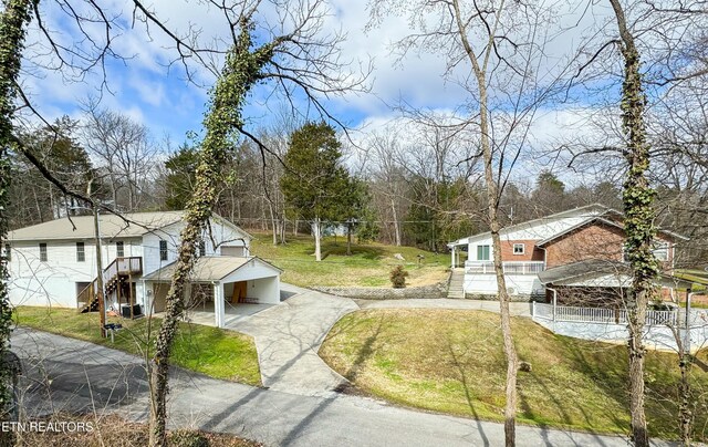 1017 Old Knoxville Hwy, Sevierville, TN 37862 - exterior space with a garage