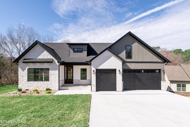 modern farmhouse style home with a garage, a porch, and a front lawn