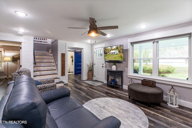 living room with dark wood-style floors, recessed lighting, stairway, ceiling fan, and baseboards