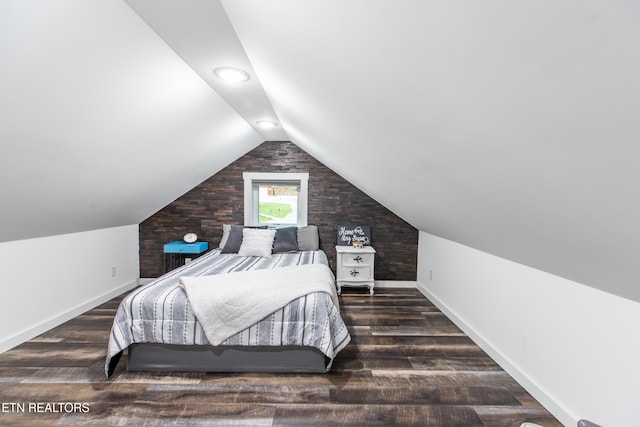 bedroom with dark wood-style floors, baseboards, vaulted ceiling, and recessed lighting