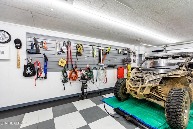 garage featuring baseboards